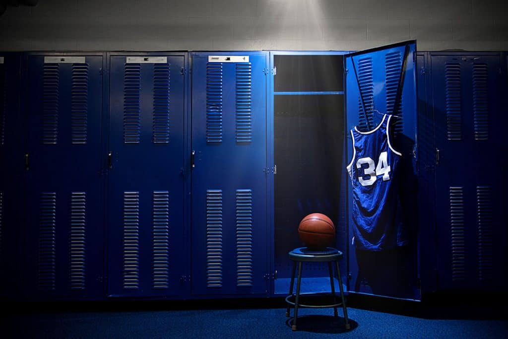 blue lockers with basketball in spotlight